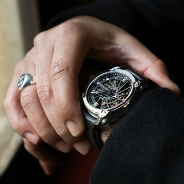 origin skeleton swiss mechanical watch on the wrist